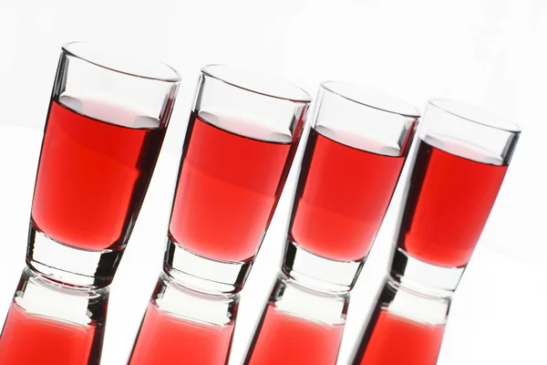 Shots with red cocktail — Stock Photo, Image