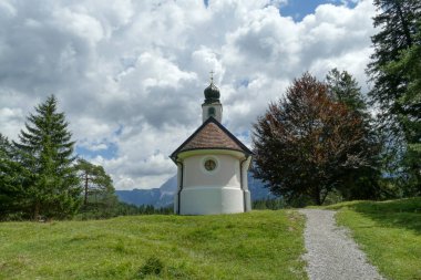 Historical chapel at the alp near Lake Lautersee and Karwendel mountains