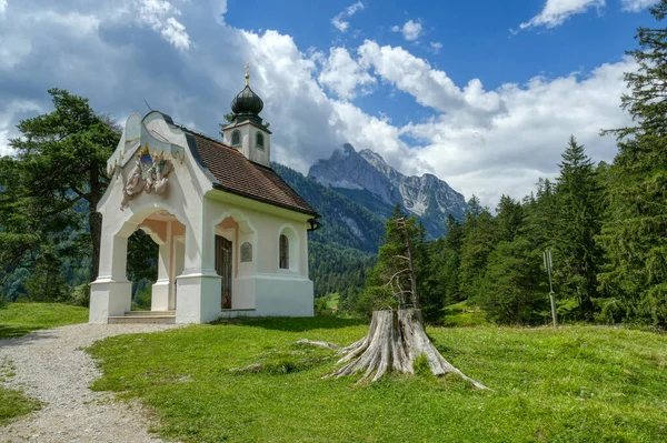 Historical chapel at the alp near Lake Lautersee and Wetterstein mountains