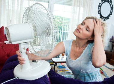 woman cooling herself clipart