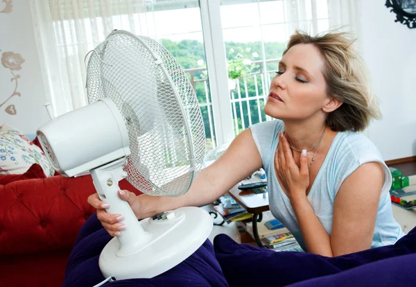 Woman cooling herself — Stock Photo, Image