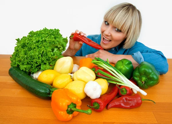 Woman with vegetables Stock Image