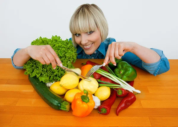 Donna con verdure Foto Stock