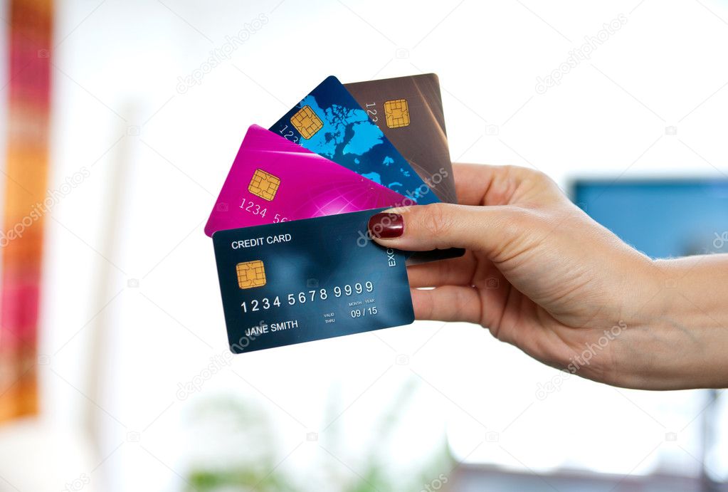 woman hand holding credit cards