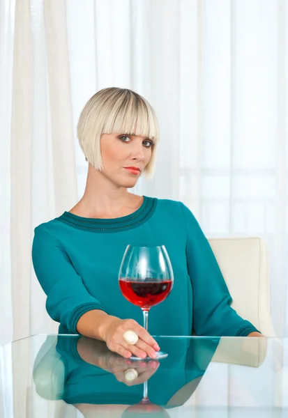 Woman with glass of wine — Stock Photo, Image