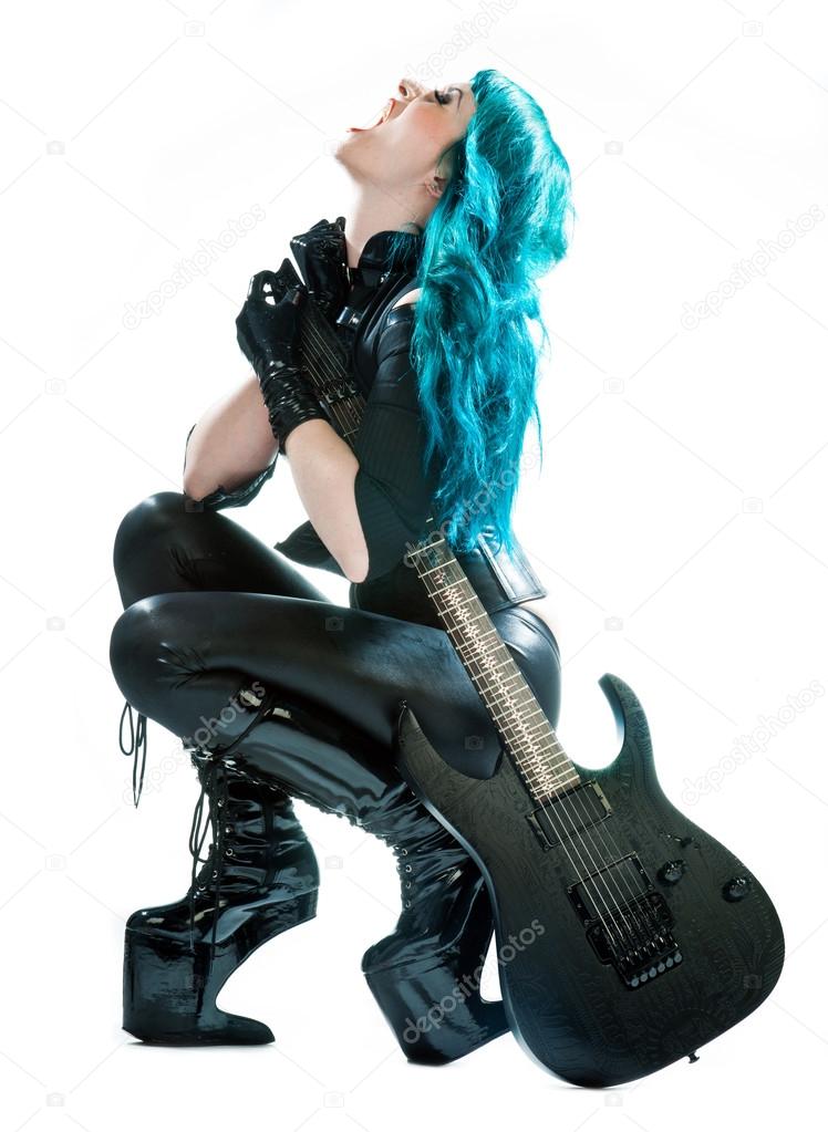 Heavy metal woman with electric guitar Stock Photo by ©bertys30 20468761