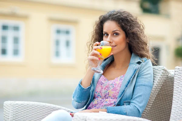 Attractive woman with orange juice — Stock Photo, Image
