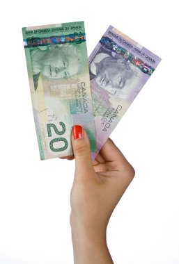 kadın el ile Kanada Doları faturaları