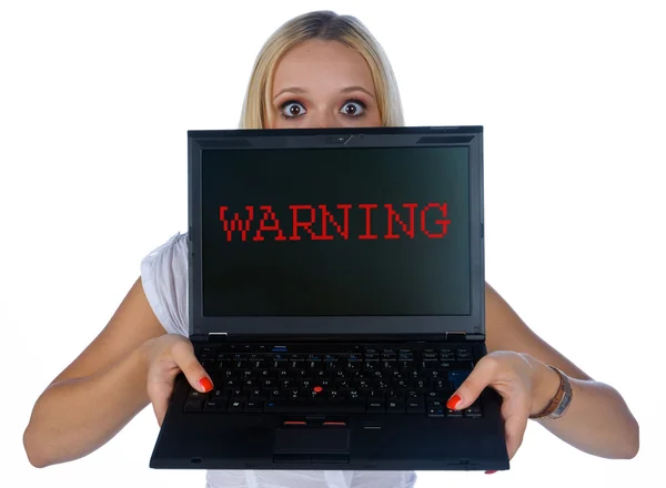 Mujer con señal de advertencia en el ordenador portátil — Foto de Stock