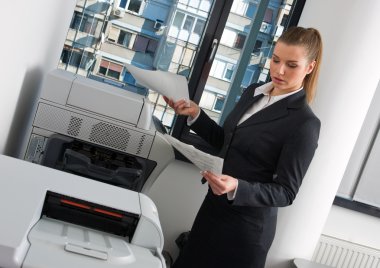 business woman next to office printer clipart