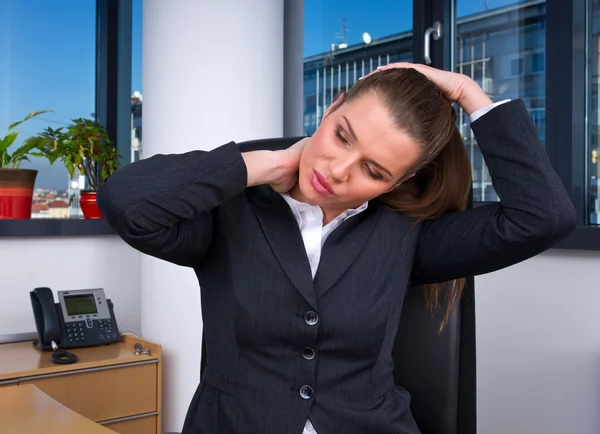 Business woman with migraine — Stock Photo, Image