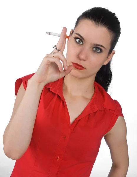 タバコを持つ若い女 ロイヤリティフリーのストック写真