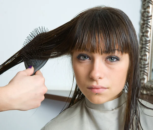 Brushing hair — Stock Photo, Image