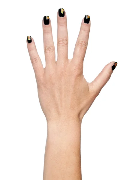 Женская рука с ухоженными ногтями — стоковое фото
