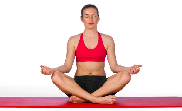 Young woman in yoga pose — Stock Photo, Image