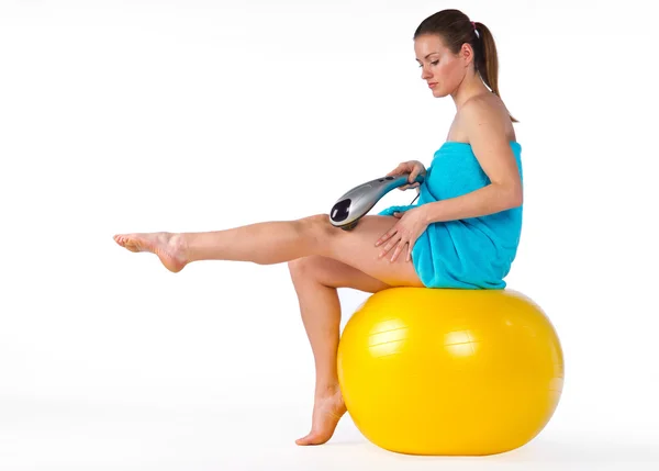 Woman with electric massager — Stock Photo, Image