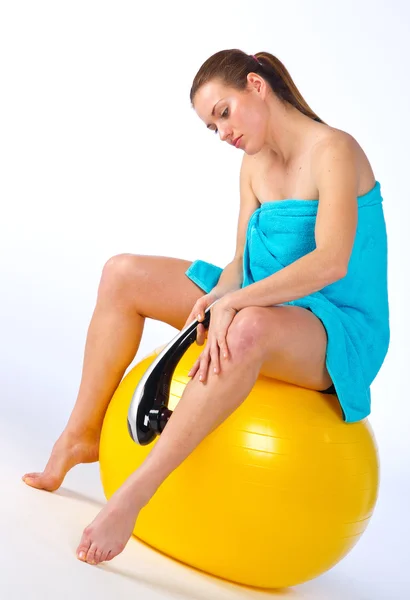 Woman with electric massager — Stock Photo, Image