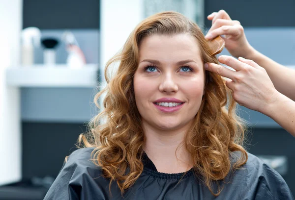 Woman in hair salon Stock Photo