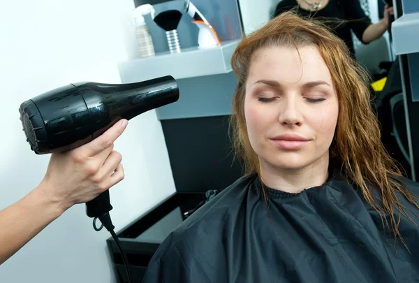 Drying hair Royalty Free Stock Images