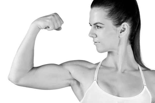 Mujer atleta mostrando bíceps — Foto de Stock