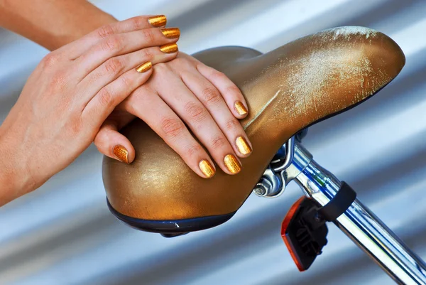 Woman manicured golden nails — Stock Photo, Image