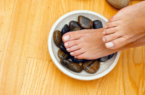 Female feet on spa treatment — Stock Photo, Image