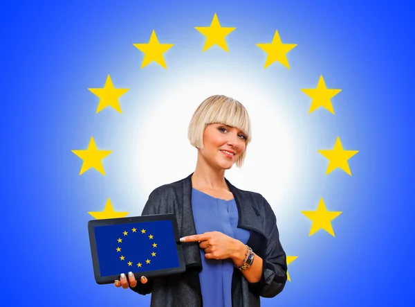 Attractive blond woman holding tablet with european flag — Stock Photo, Image