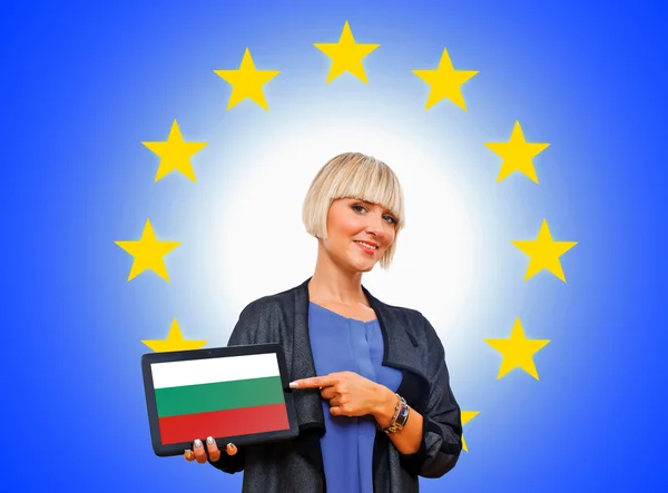 Woman holding tablet with bulgarian flag on european union back — Stock Photo, Image
