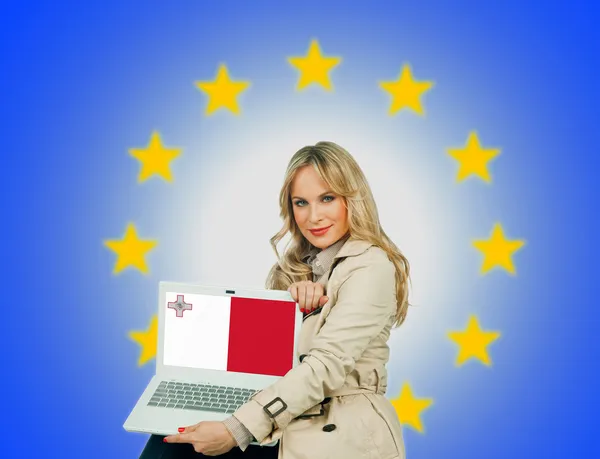 Woman holding laptop with malta flag — Stock Photo, Image