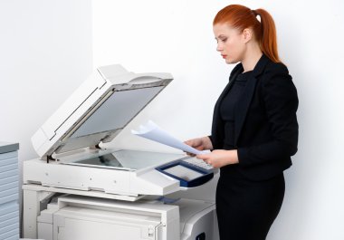 business woman working on office printer clipart