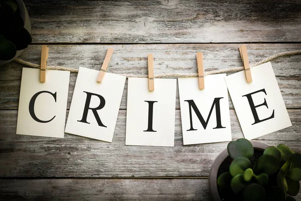 Set Printed Cards Spelling Word Crime Aged Wooden Background — Stock Photo, Image