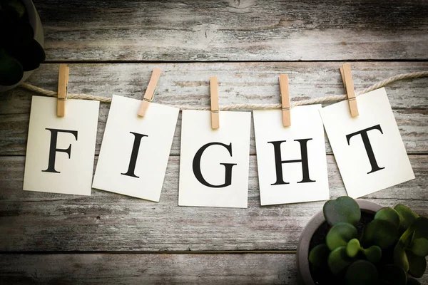 Set Printed Cards Spelling Word Fight Aged Wooden Background — Stock Photo, Image