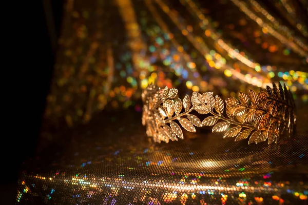 Golden laurel wreath, crown on luxury gold bacground