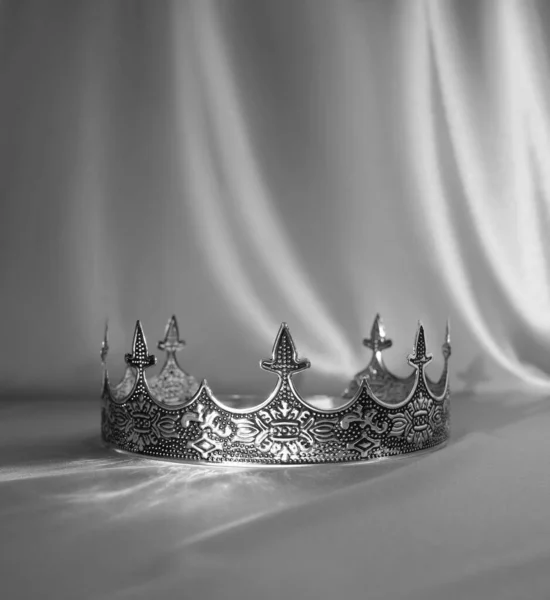 Ancient vintage male crown, fairy tale. Black and white photo. Vintage.