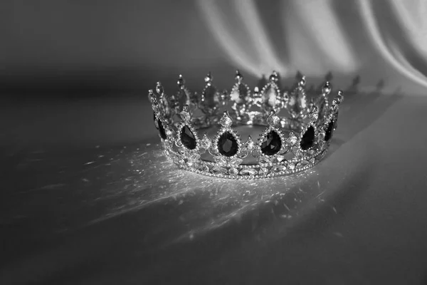 Sapphire vintage crown. Symbol of success, monarchy and wealth. Black and white photo. Vintage.