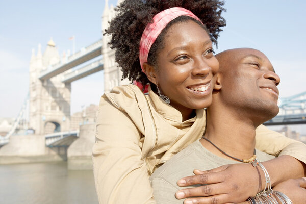 african american tourist couple visiting the Tower of London