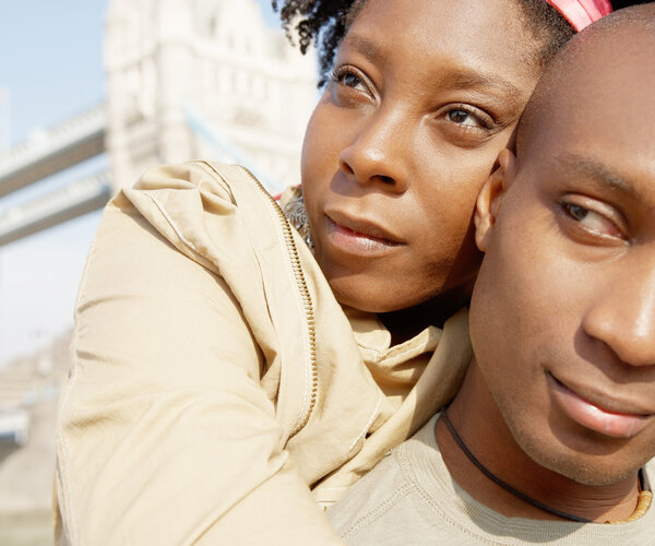 Close up portrait of an attractive african american couple visiting the Tower of London