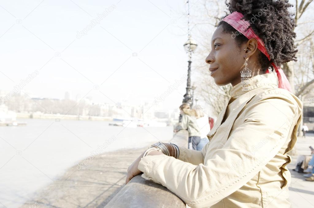 african american woman at London's river Thames