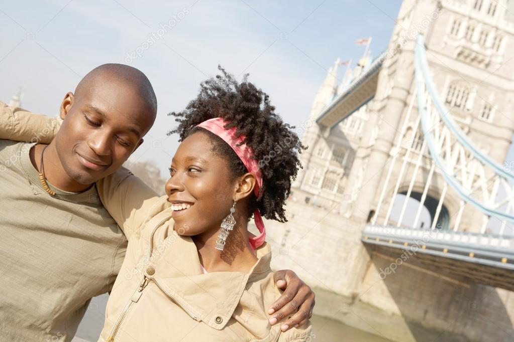Young attractive black couple visiting the Tower of London