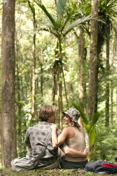 Man and woman hugging in the forest. — Stock Photo, Image