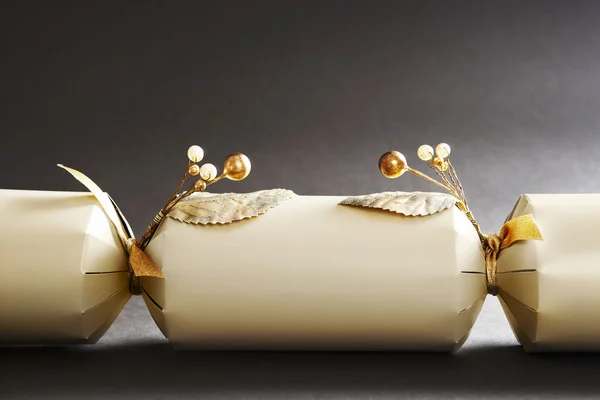 Gold Christmas cracker decorated with beads and pearls. — Stock Photo, Image