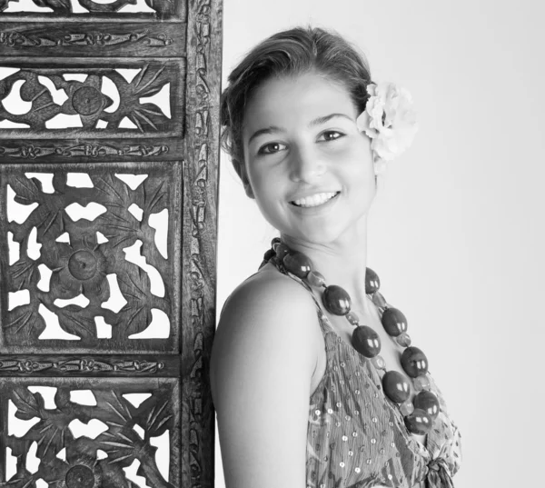 Black and white portrait of an attractive young woman wearing an exotic outfit — Stock Photo, Image