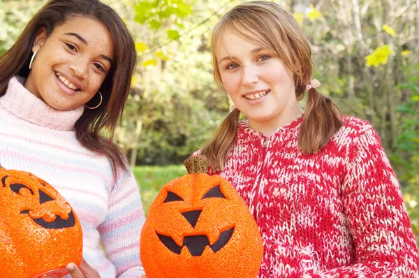 Two girls halloween pumpkins — Stock Photo, Image