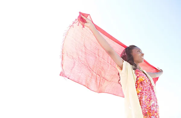 Woman holding  red sarong — Stock Photo, Image