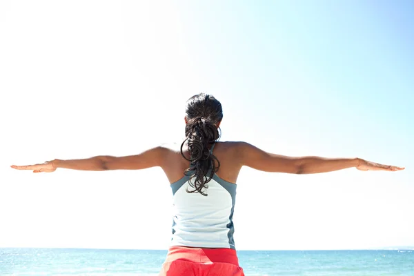 Woman stretching her arms — Stock Photo, Image