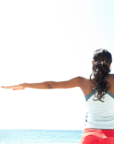 Woman stretching her arms — Stock Photo, Image