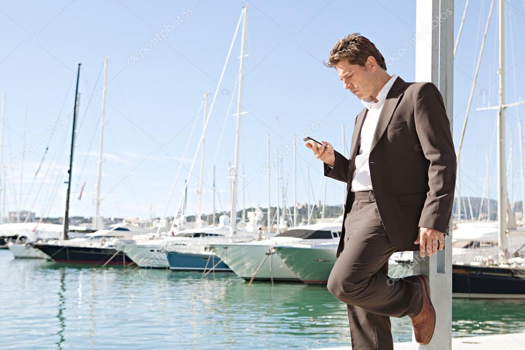 Businessman using his smart phone
