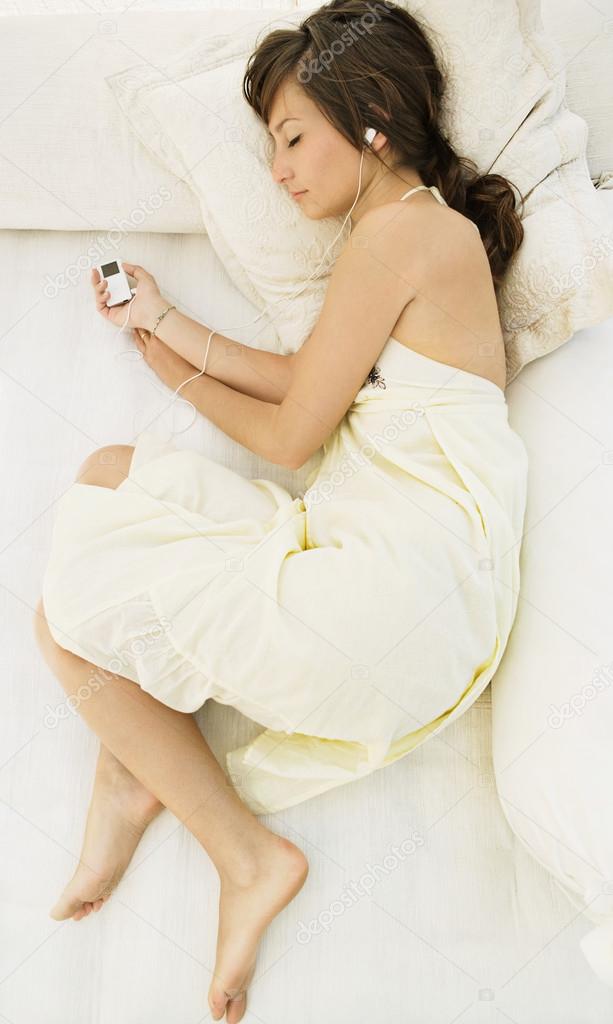 Woman laying on bed Stock Photo by ©mjth 42534317