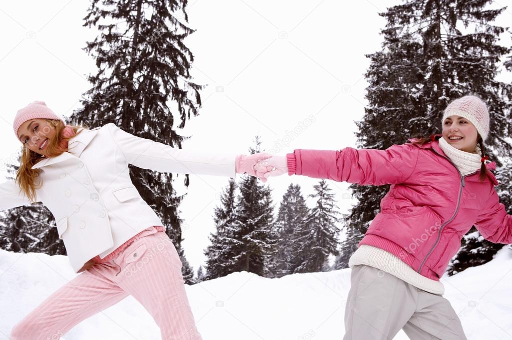 Girls  in snow mountains