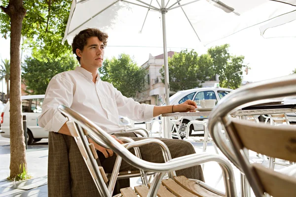 Young businessman having  coffee — Stock Photo, Image